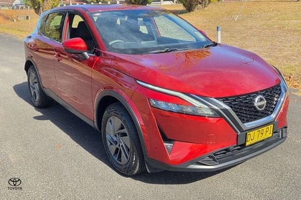 2024 Nissan QASHQAI ST in Fuji Sunset Red