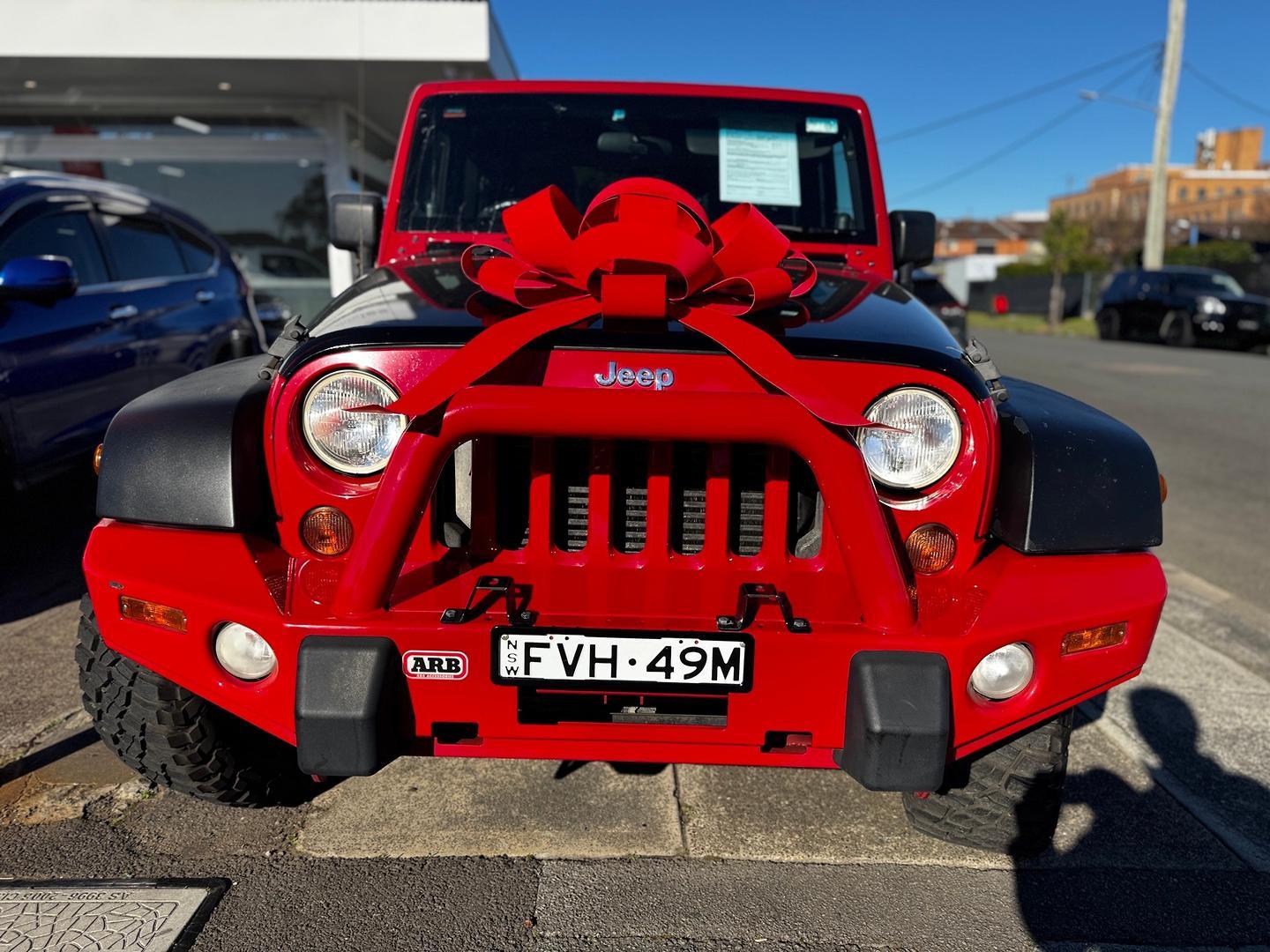 2010 Jeep Wrangler Sport in Red