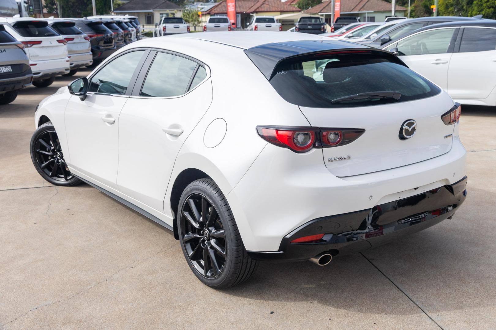 2024 Mazda 3 G25 Evolve SP in Snowflake White Pearl