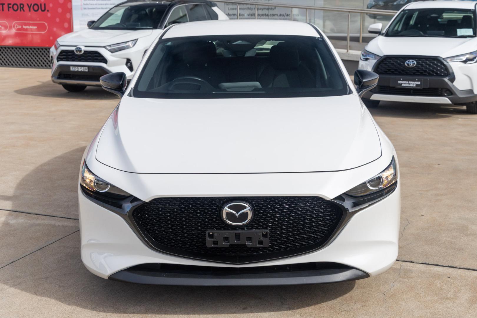 2024 Mazda 3 G25 Evolve SP in Snowflake White Pearl