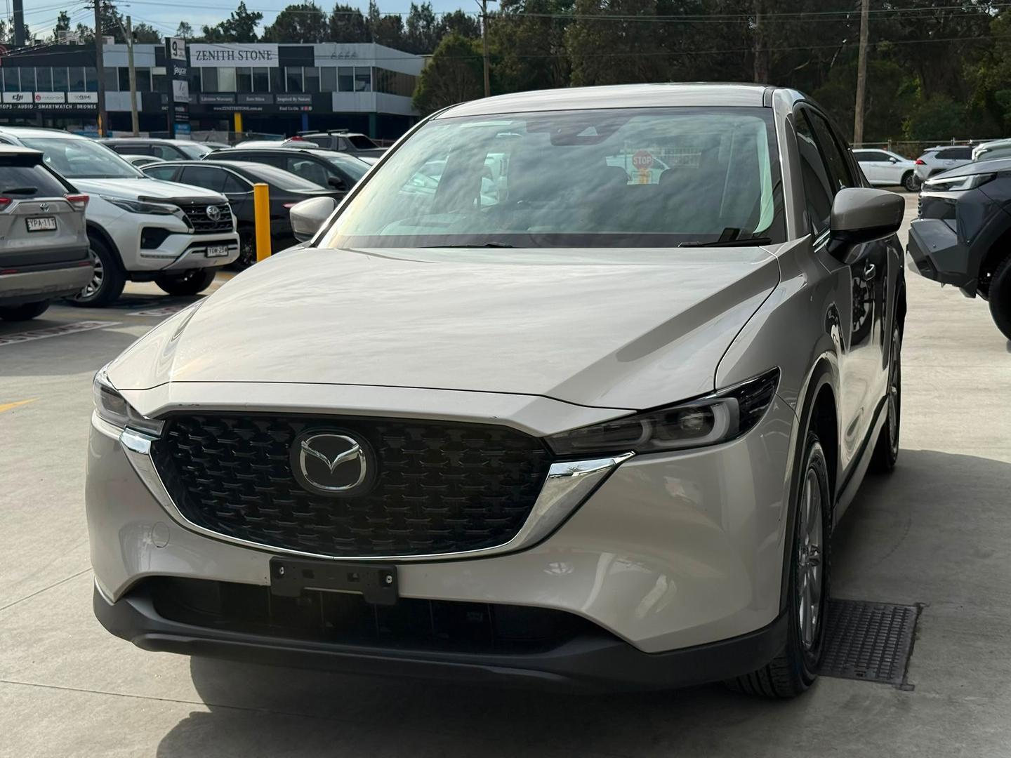 2024 Mazda CX-5 G25 Maxx Sport in Gold