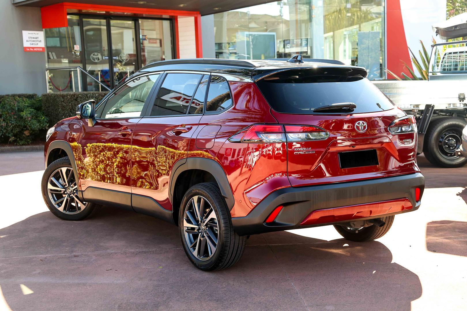 2025 Toyota Corolla Cross Atmos 2WD in Two Tone Red