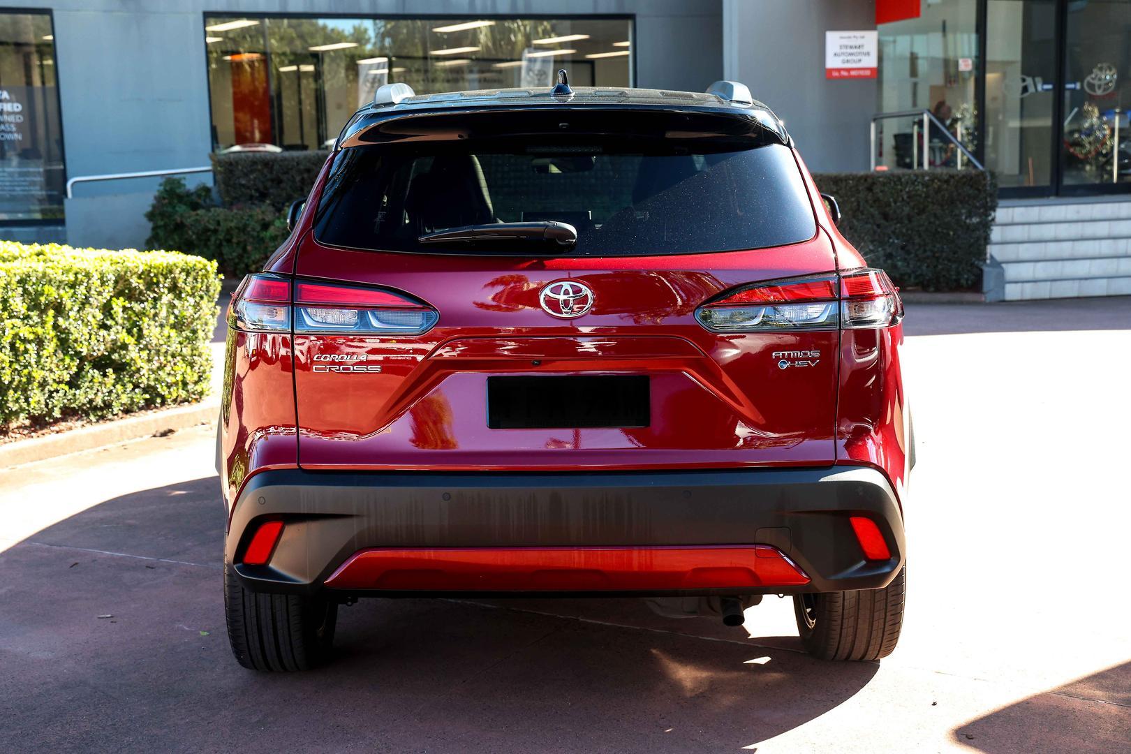 2025 Toyota Corolla Cross Atmos 2WD in Two Tone Red