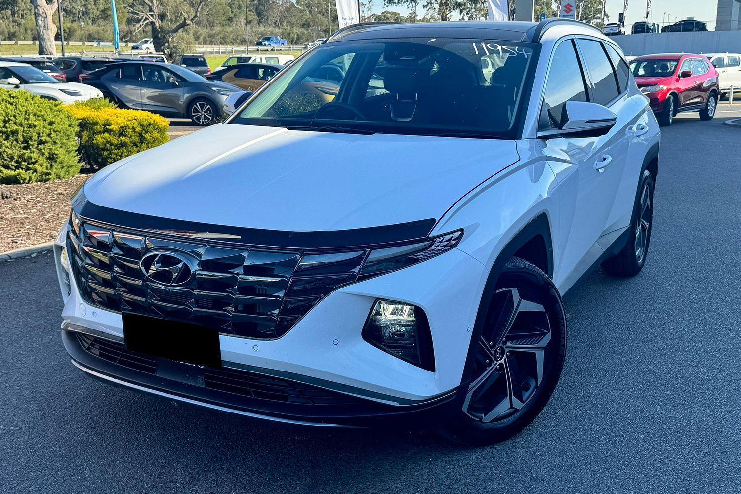 2023 Hyundai Tucson Highlander in White Cream