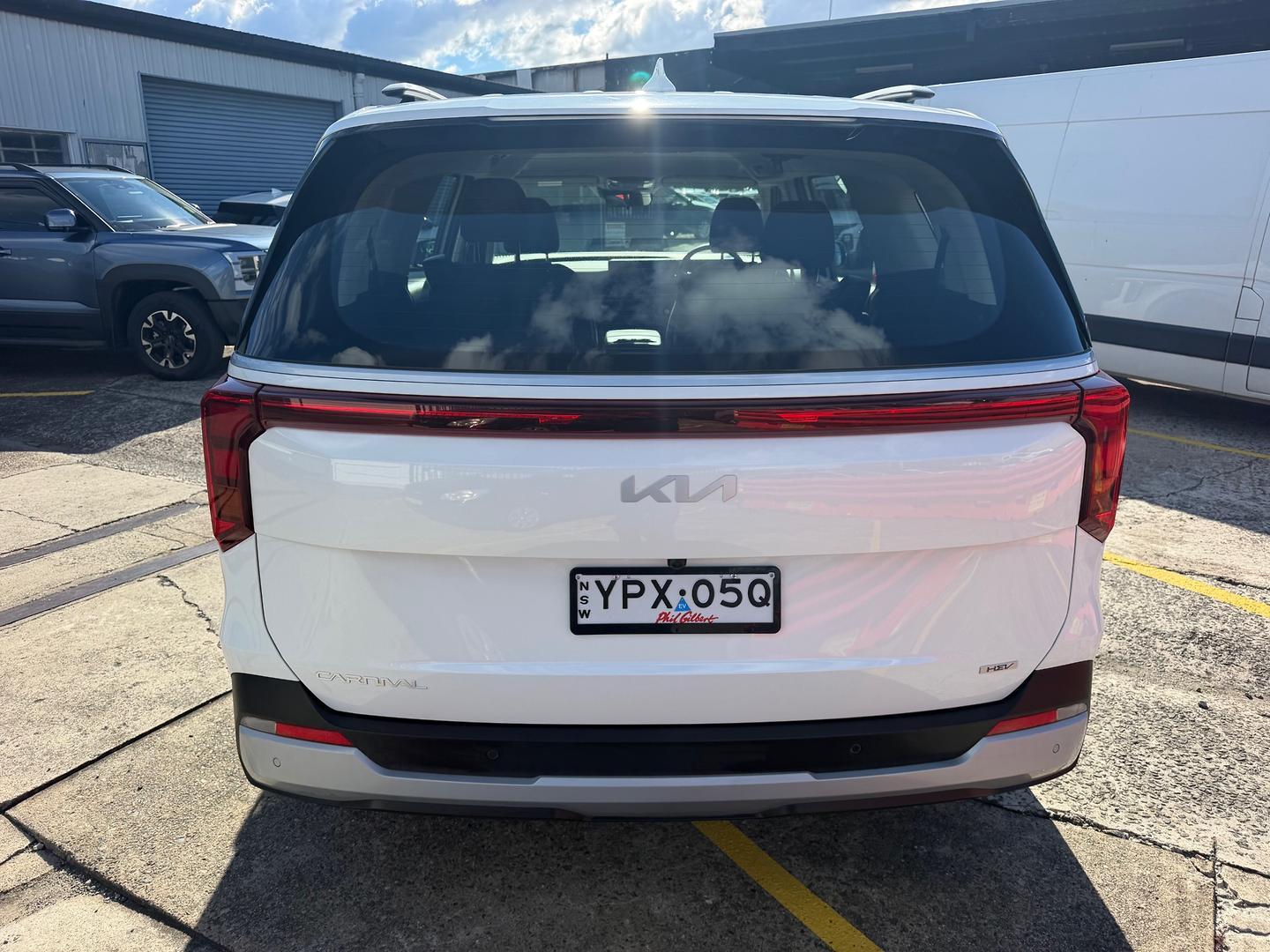 2025 Kia Carnival S HEV in Snow White Pearl (Swp)