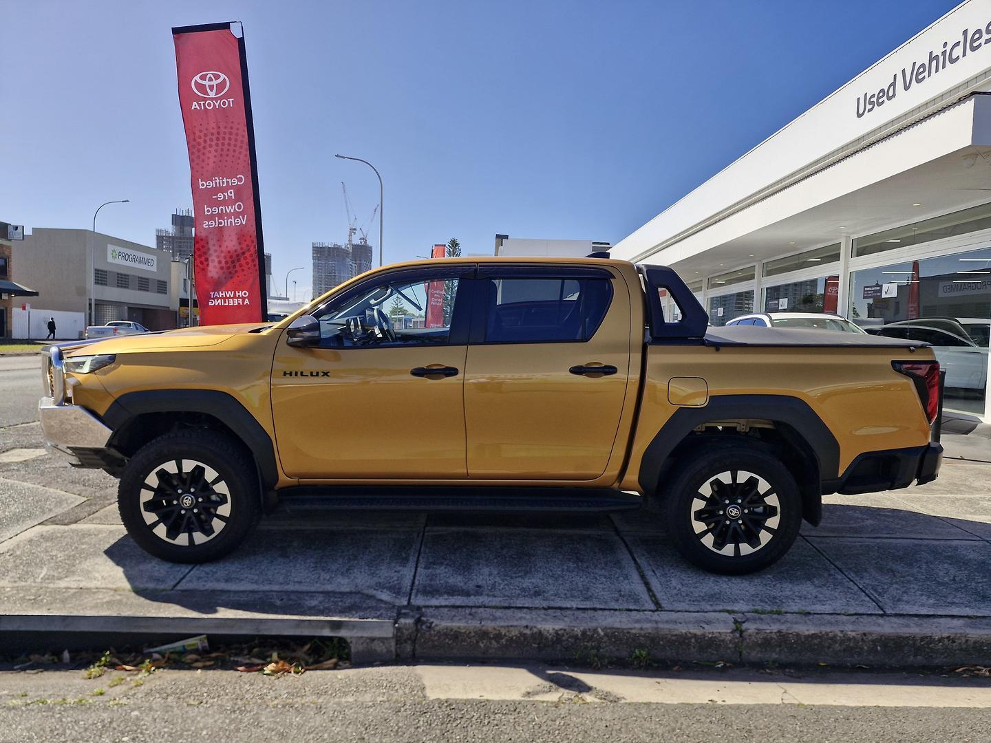 2025 Toyota Hilux SR5+ in Orange