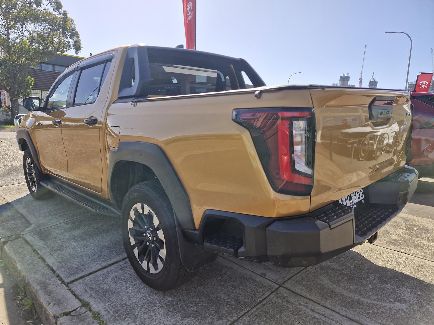 2025 Toyota Hilux SR5+ in Orange