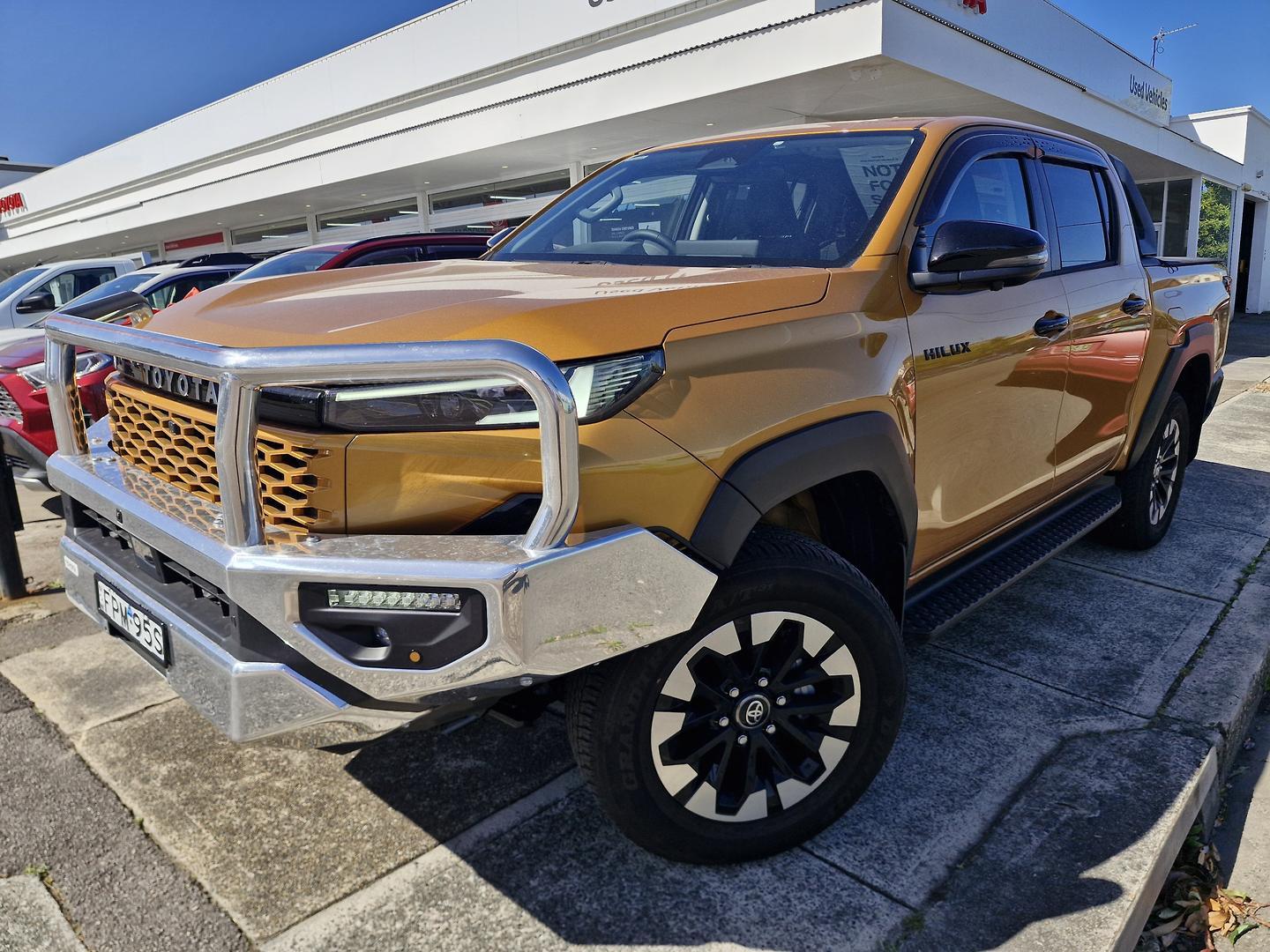 2025 Toyota Hilux SR5+ in Orange