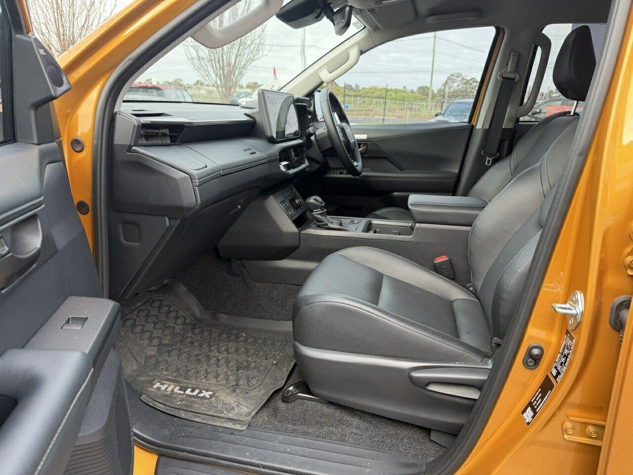 2025 Toyota Hilux SR5+ in Orange